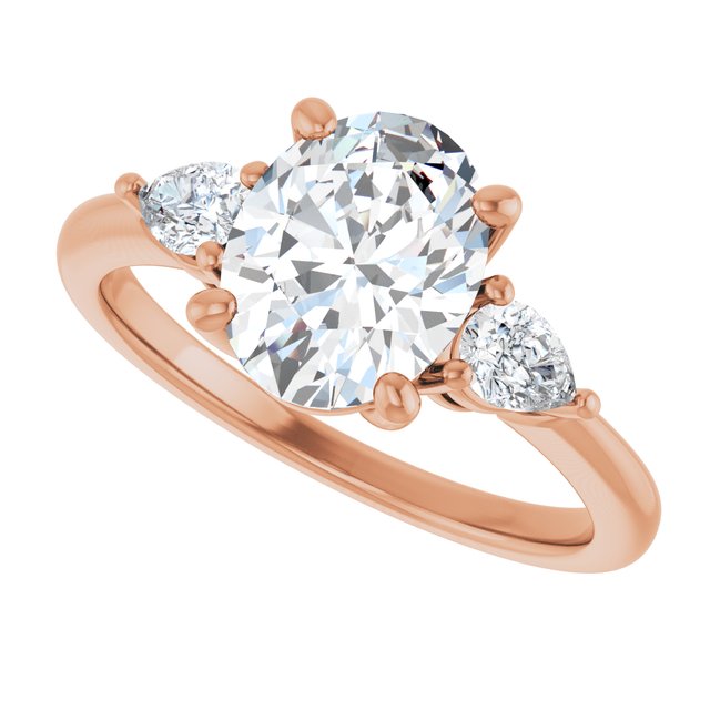 Three-stone engagement ring with pear side stones in 14K gold, diamond center, on hand variant--Oval variant--2CT variant--14K-rose-gold