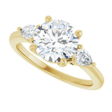Three-stone engagement ring with pear side stones in 14K gold, diamond center, three-quarter angle variant--Round variant--2CT variant--14K-yellow-gold