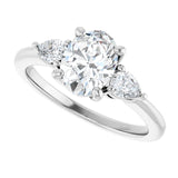 Three-stone engagement ring with pear side stones in 14K gold, diamond center, three-quarter angle variant--Oval variant--1CT variant--14K-white-gold