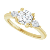 Three-stone engagement ring with pear side stones in 14K gold, diamond center, on hand variant--Cushion variant--1CT variant--14K-yellow-gold