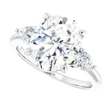 Three-stone engagement ring with pear side stones in 14K gold, diamond center, on hand variant--Oval variant--4CT variant--14K-white-gold