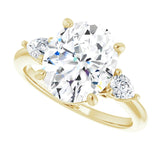 Three-stone engagement ring with pear side stones in 14K gold, diamond center, overhead variant--Oval variant--4CT variant--14K-yellow-gold