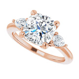 Three-stone engagement ring with pear side stones in 14K gold, diamond center, three-quarter angle variant--Cushion variant--3CT variant--14K-rose-gold
