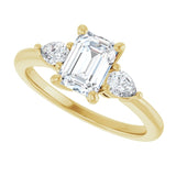 Three-stone engagement ring with pear side stones in 14K gold, diamond center, on hand variant--Emerald variant--1CT variant--14K-yellow-gold