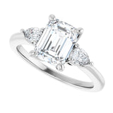 Three-stone engagement ring with pear side stones in 14K gold, diamond center, showing setting detail variant--Emerald variant--2CT variant--14K-white-gold