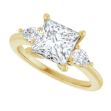 Three-stone engagement ring with pear side stones in 14K gold, diamond center, in packaging variant--Square variant--2CT variant--14K-yellow-gold
