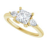Three-stone engagement ring with pear side stones in 14K gold, diamond center, three-quarter angle variant--Square variant--1CT variant--14K-yellow-gold