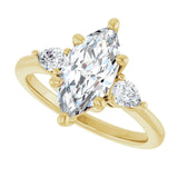 Three-stone engagement ring with pear side stones in 14K gold, diamond center, close-up of pear side stones variant--Marquise variant--2CT variant--14K-yellow-gold
