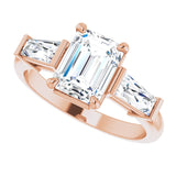 Three-stone baguette side stone ring in 14K gold, diamond center, three-quarter angle/2-CT.5CT variant--Emerald variant--1.5CT variant--14K-rose-gold
