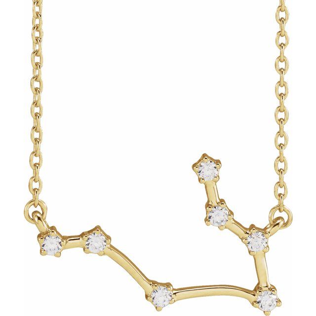 Gemini diamond constellation necklace in 14K yellow gold on neutral background