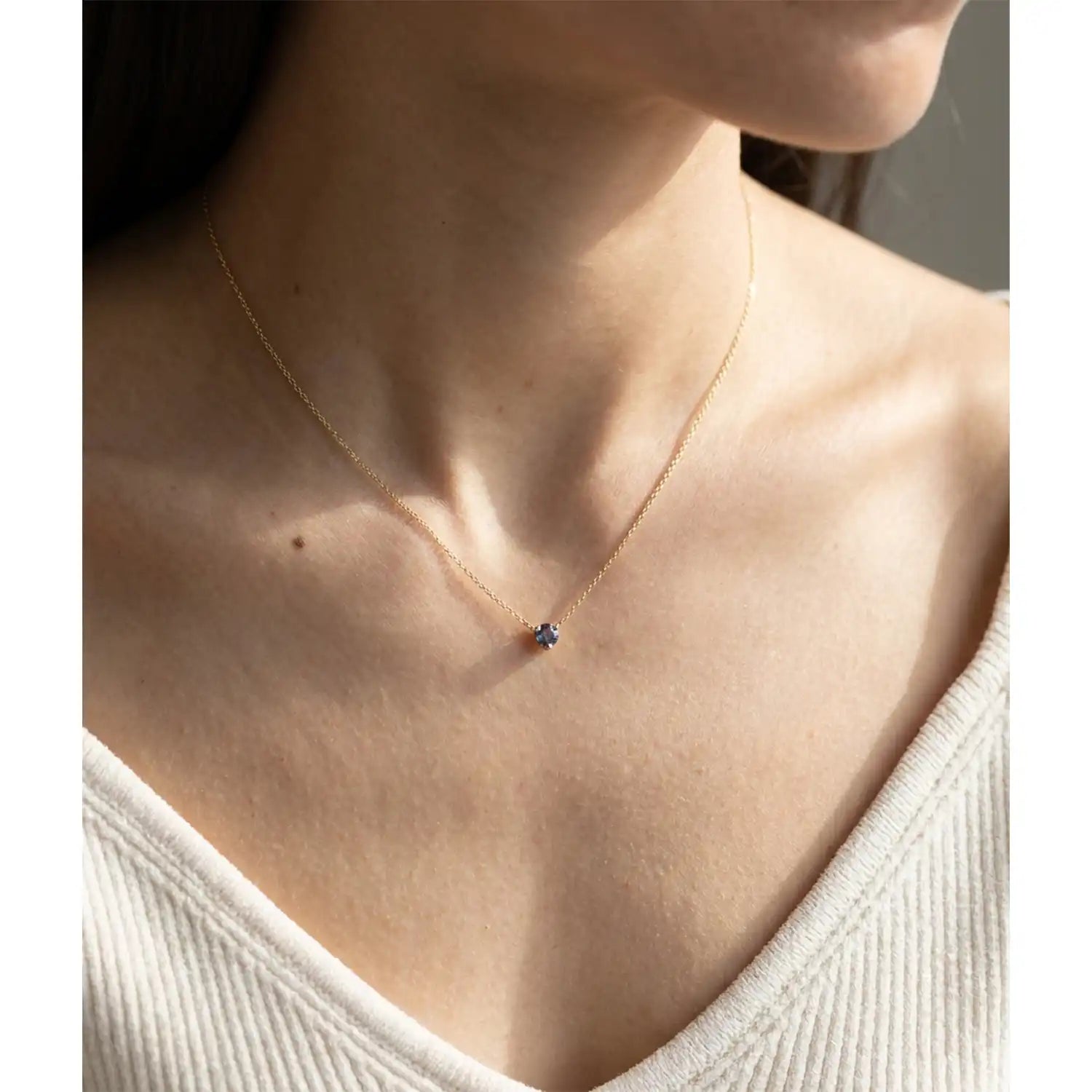 14K gold alexandrite necklace shown on model variant--14K-rose-gold,  variant--14K-yellow-gold,  variant--14K-white-gold, variant--Sterling-silver, variant--Alexandrite