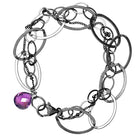 Natural amethyst woven chain bracelet in sterling silver, flat lay on neutral background sterling silver variant--Oxidized-sterling-silver
