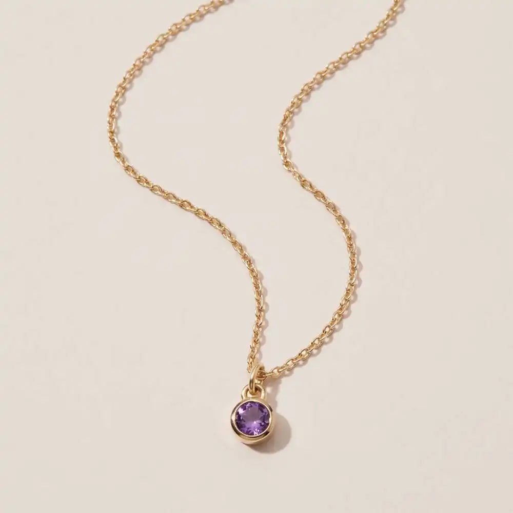 Amethyst birthstone necklace — crafted in 14K gold with a vivid birthstone centerpiece