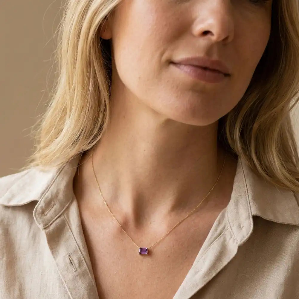 Minimalist birthstone necklace featuring a 5x3mm emerald shown on model variant-14K-yellow-gold variant-14K-white-gold variant-14K-rose-gold variant-Sterling-silver