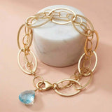Gold chain bracelet with aquamarine accent. variant--Gold-fill variant--Sterling-silver variant--Oxidized-sterling-silver variant--Aquamarine