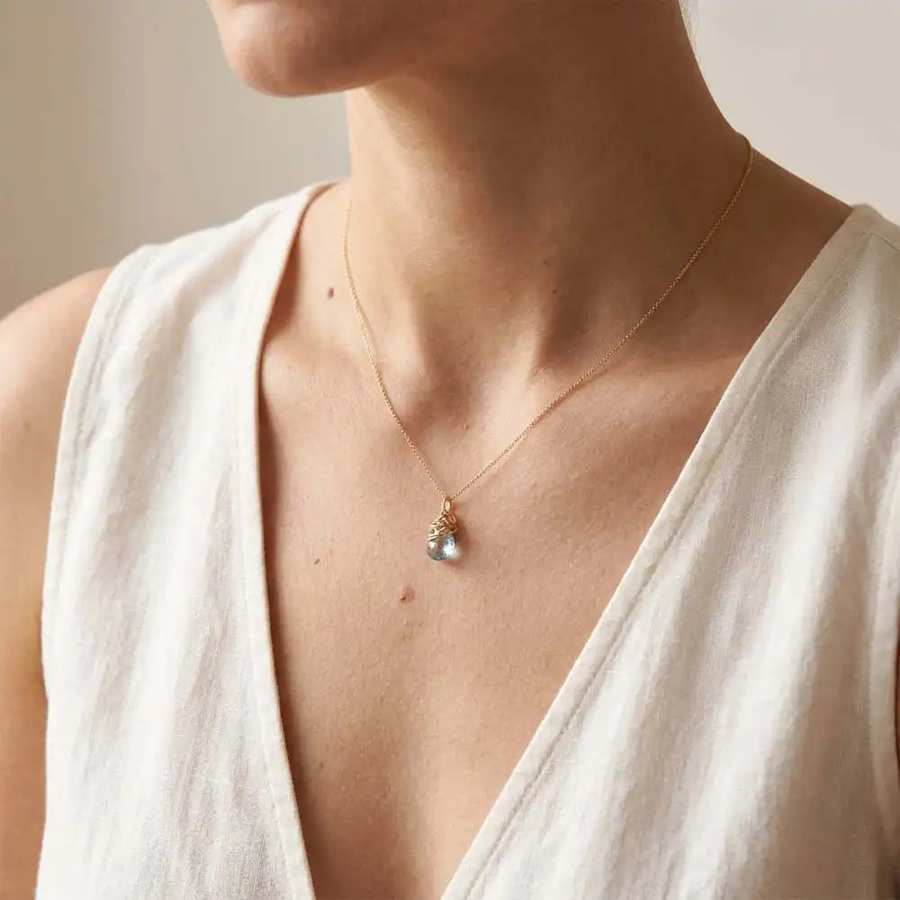 Handmade designer aquamarine pendant necklace shown on model variant--Gold-fill variant--Rose-Gold-fill variant--Sterling-silver variant--Oxidized-sterling-silver variant--Aquamarine