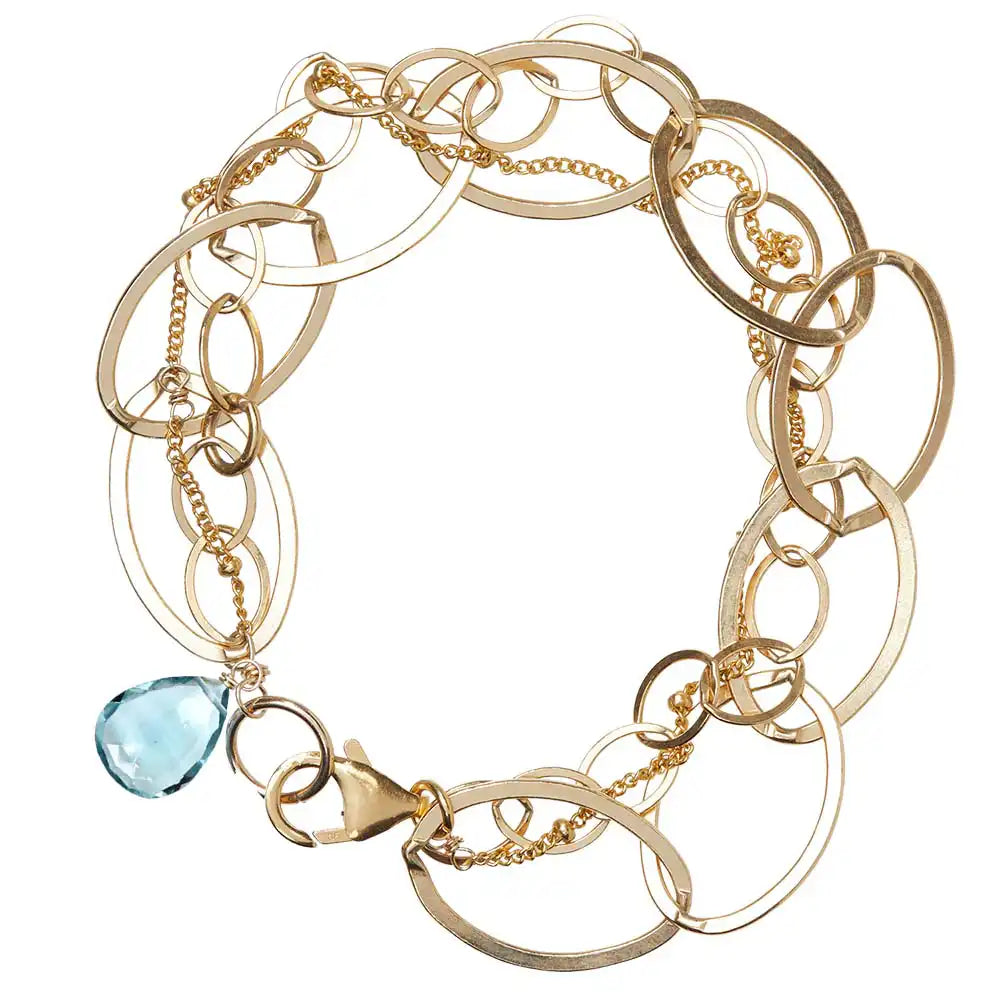 Natural aquamarine woven chain bracelet in 14K gold-fill, close-up of setting in sterling silver