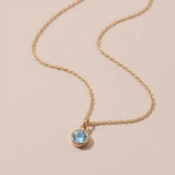 Aquamarine birthstone necklace, handmade charm with a symbolic aquamarine birthstone for March