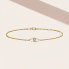 Aquamarine bezel-set bracelet with a curb chain in silver. variant--Sterling silver