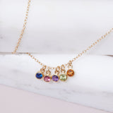 Gift-ready birthstone charm collection on chain - family story