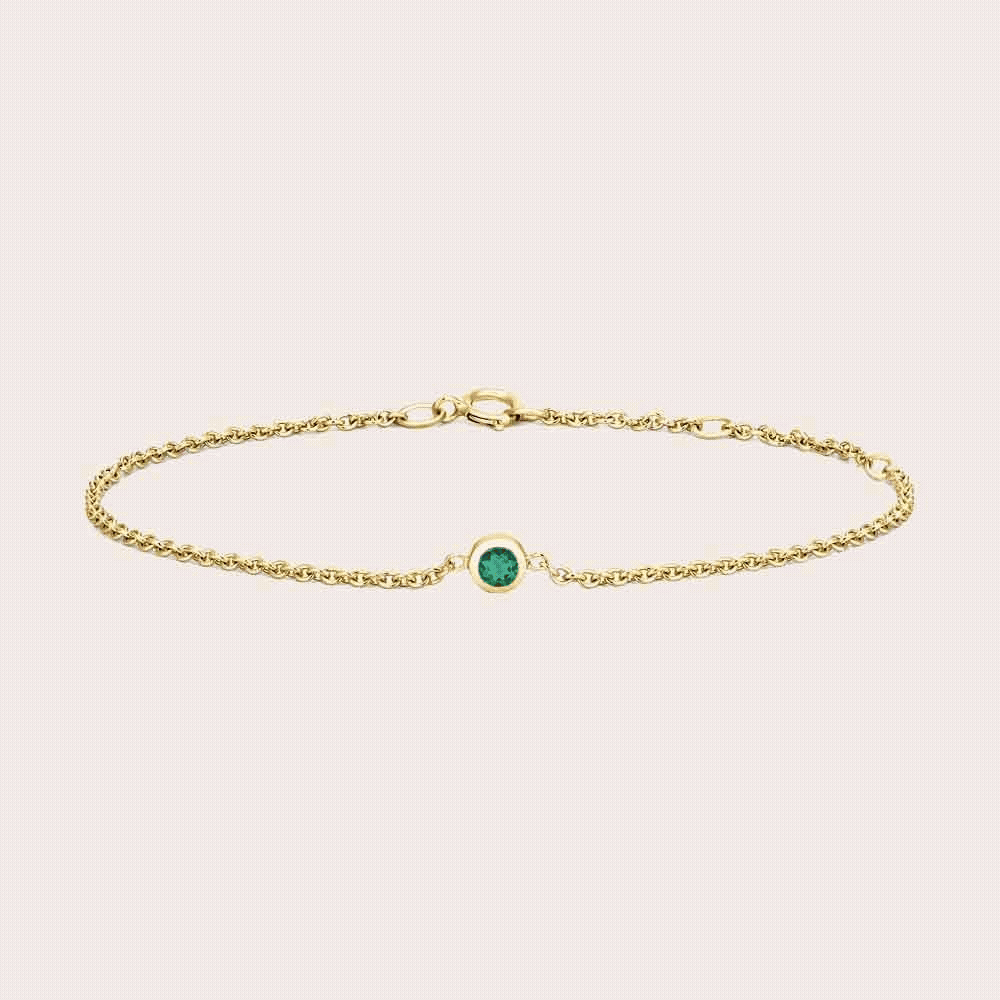 Bezel-set peridot bracelet shown cycling through all twelve birthstones