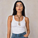 Black braided chain and silk lariat necklace in 14K gold-fill, wrapped on model