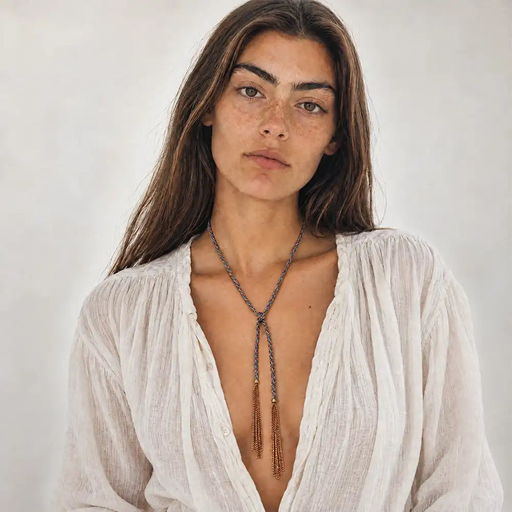 Blue braided chain and silk lariat necklace in 14K gold-fill, worn long on model