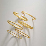 Hinged bangle bracelet in 14K gold, 5mm width, editorial styling