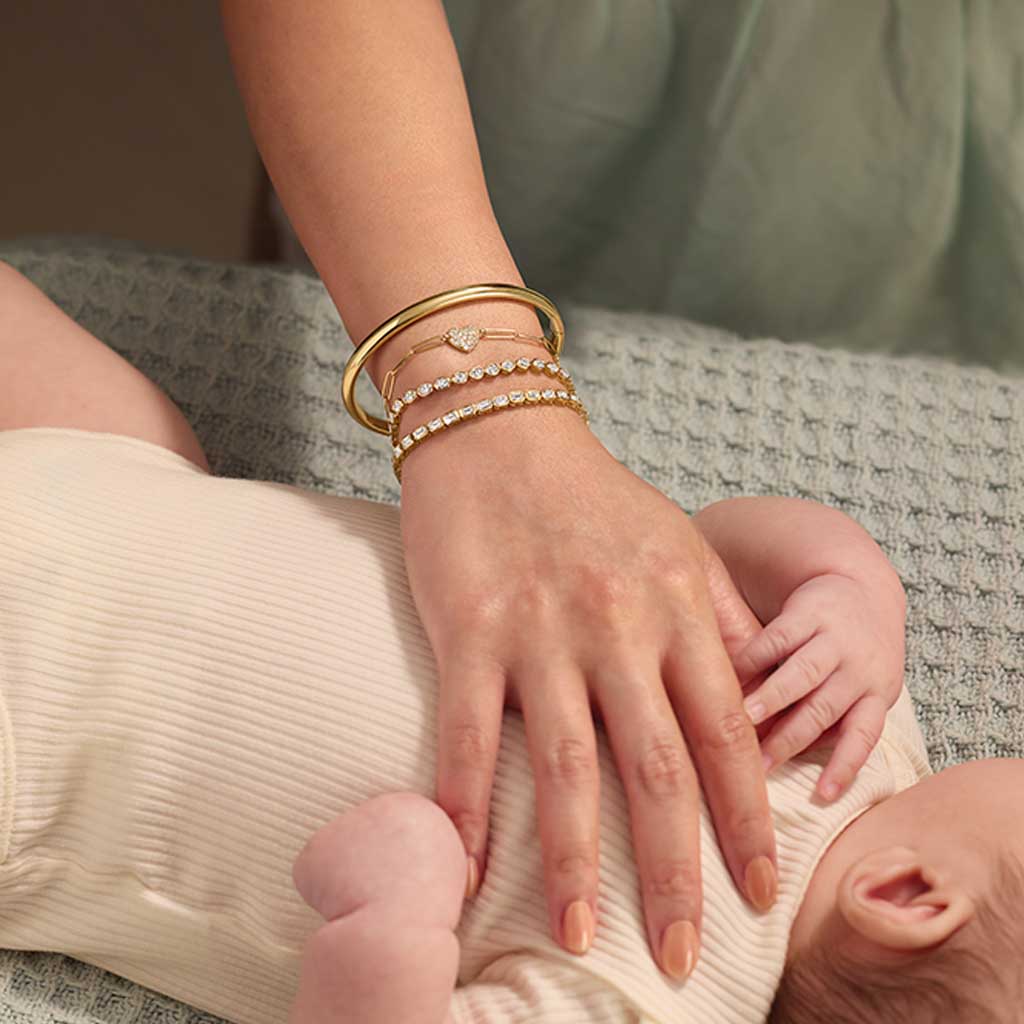 Round gold cuff bracelet overhead view showing width