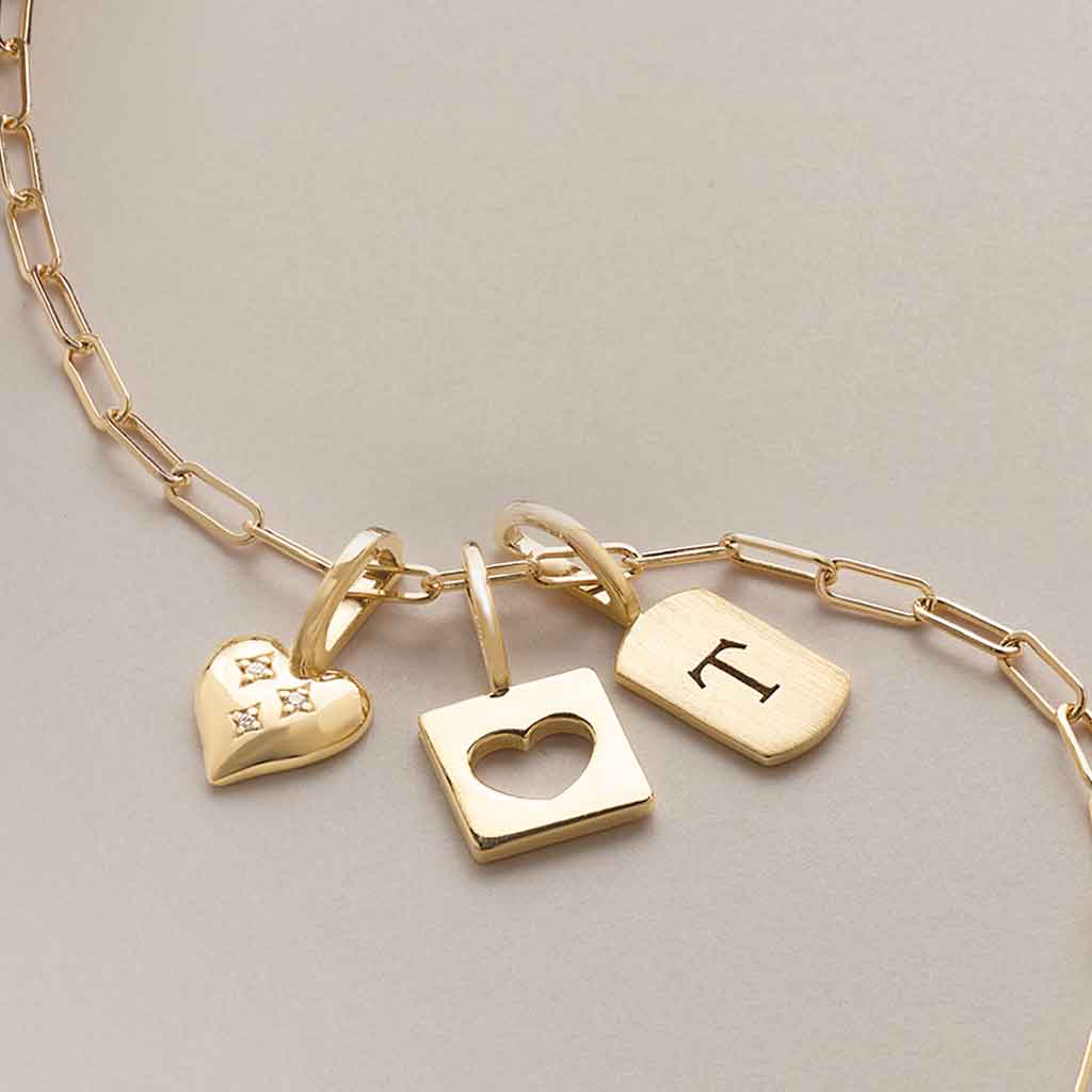 whisper paper clip chain in solid 14k gold with charms