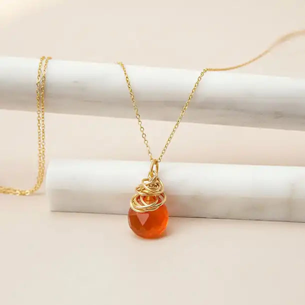 Natural carnelian pendant necklace in sterling silver, styled on chain necklace