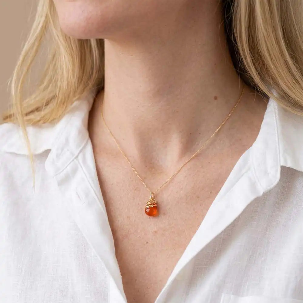 Carnelian pendant necklace shown on model