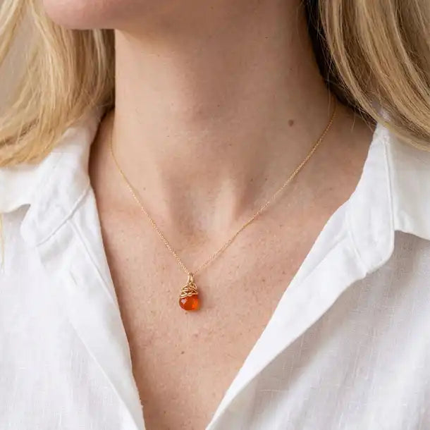 Natural carnelian pendant necklace in sterling silver, close-up of setting in gold-fill