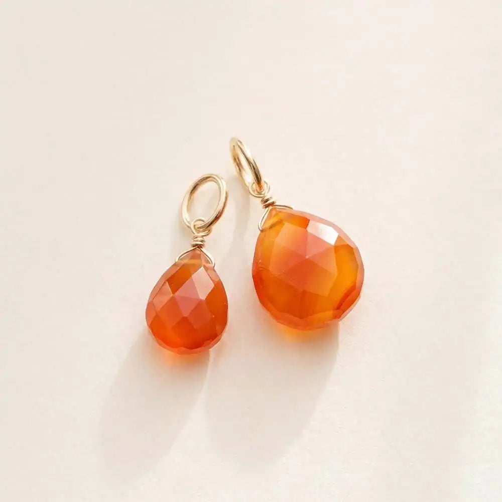 Hand-cut carnelian briolette pendant, 6mm in size and finished in lustrous gold-fill.
