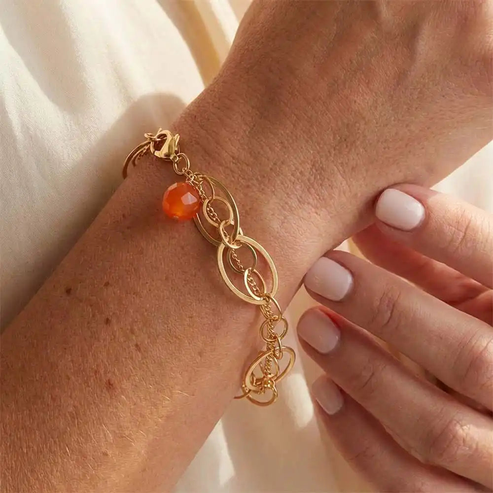 Natural carnelian woven chain bracelet in sterling silver, close-up of setting in gold-fill