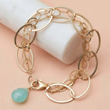 Natural chalcedony woven chain bracelet in sterling silver, styled on chain necklace