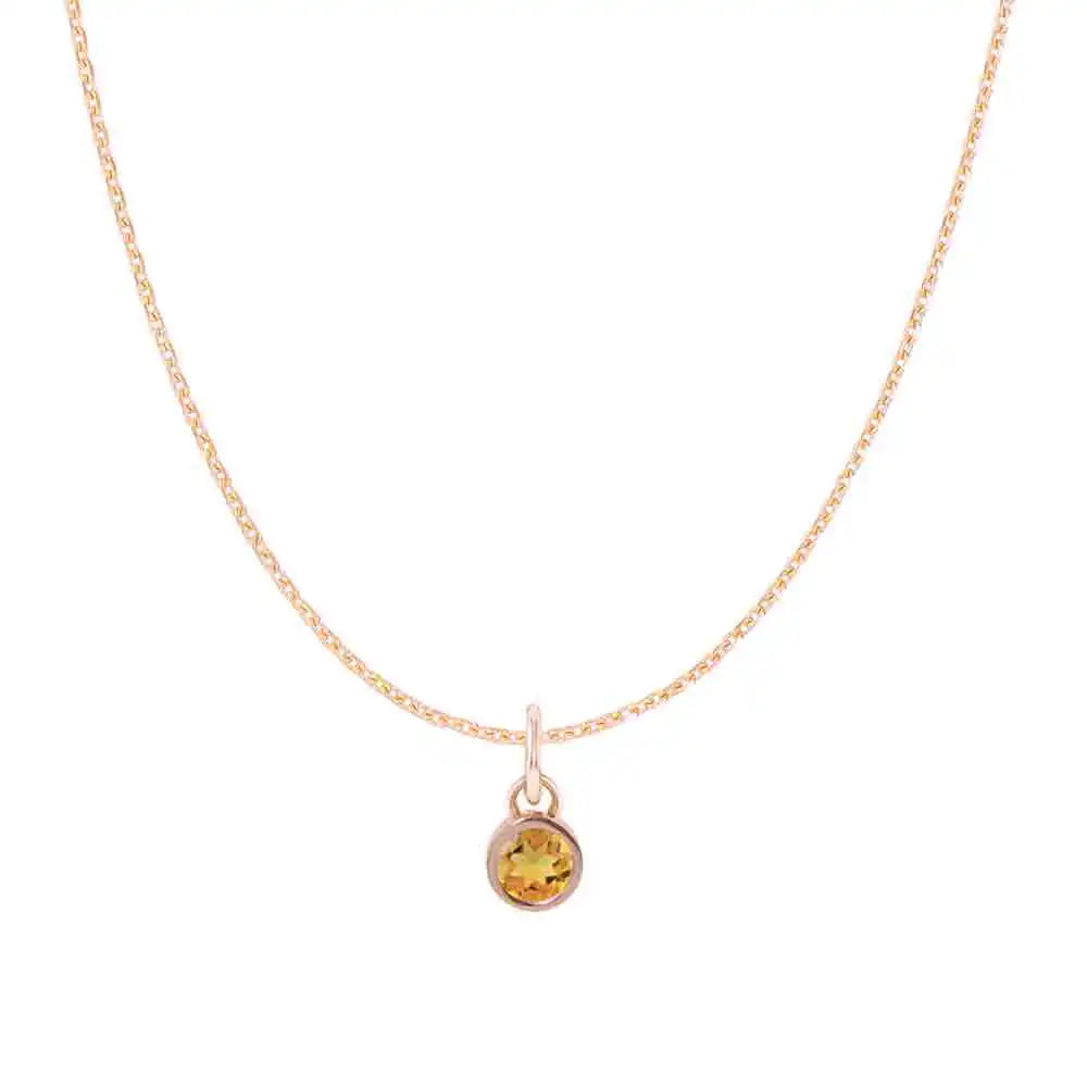 Citrine birthstone charm necklace in 14K rose gold, bezel-set pendant, product shot variant--14K-rose-gold variant--Citrine