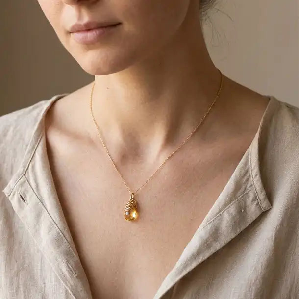 Handmade designer citrine pendant necklace shown on model variant--Gold-fill, variant--Rose-gold-fill, variant--Sterling-silver, variant--Oxidized-sterling-silver variant--Citrine