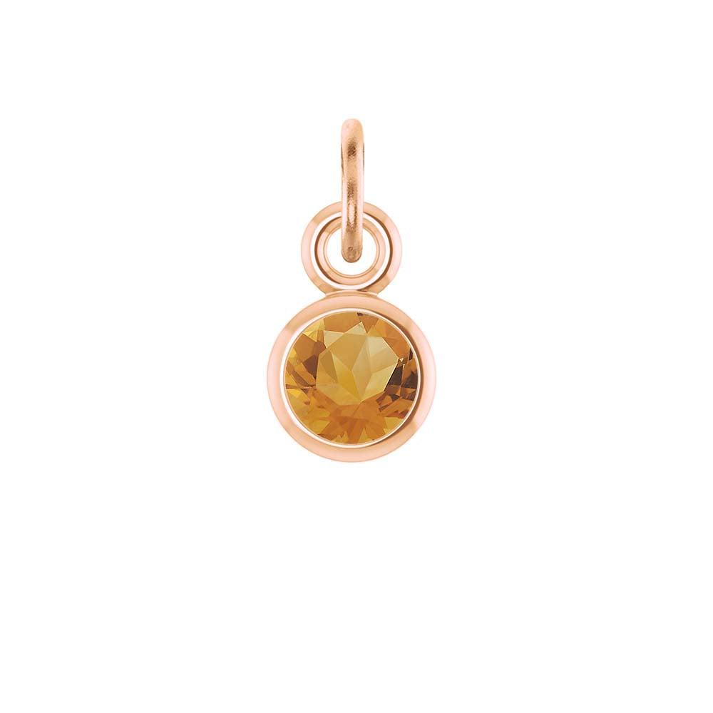 Citrine birthstone charm bezel-set in 14k rose gold — warm yellow gemstone jewelry gift.