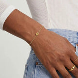 Model wearing bezel-set citrine bracelet. variant--14K-yellow-gold variant--Citrine