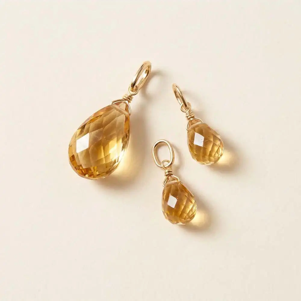 Faceted teardrop charm in citrine, 6mm, suspended from artisan gold-fill wrap.