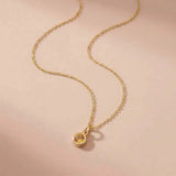 Citrine birthstone necklace,crafted in 14K gold with a vivid birthstone centerpiece
