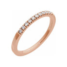 14K rose gold stacking band featuring a petite lab-created diamond gemstone for daily elegance.