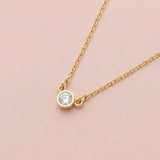 Bezel-set diamond necklace in 14K white gold on cable chain