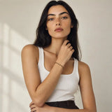 Black Enamel Gold-fill Bracelet worn on a model