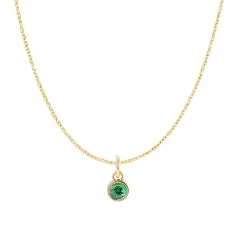 Emerald charm necklace detail, simple bezel-set natural emerald on gold chain variant--14K-yellow-gold variant--Emerald