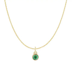 Emerald charm necklace detail, simple bezel-set natural emerald on gold chain variant--14K-yellow-gold variant--Emerald