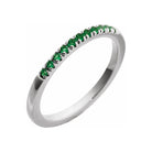 Handcrafted stackable ring in 14K white gold, adorned with a subtle lab-created emerald gem.
