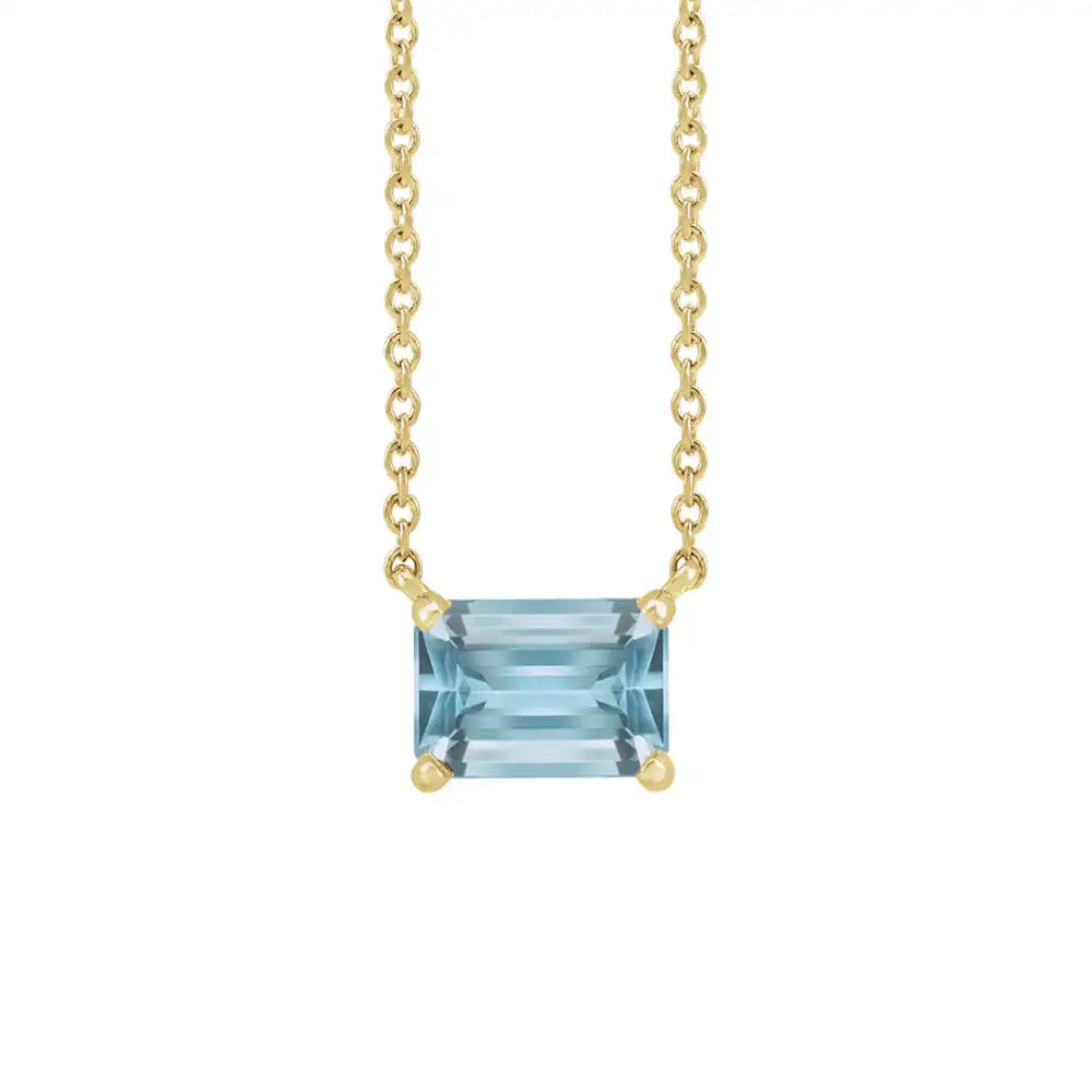 Modern 14K yellow gold necklace featuring east-west emerald-cut aquamarine gemstone for birth month elegance variant--14K-yellow-gold variant--Aquamarine