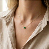 Minimalist birthstone necklace featuring a 5x3mm emerald shown on model variant-14K-yellow-gold variant-14K-white-gold variant-14K-rose-gold variant-Sterling-silver
